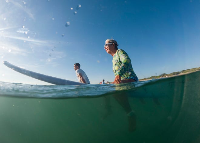 Nicki Campbell, 81, of Stuart, waits for a wave with friends, Thursday, Sept. 9, 2022, at Santa Lucea Beach on Hutchinson Island. "I love to taste the saltwater when I get in. You float both physically and mentally, you're one with the water," said Campbell. "It's quite an adventure."