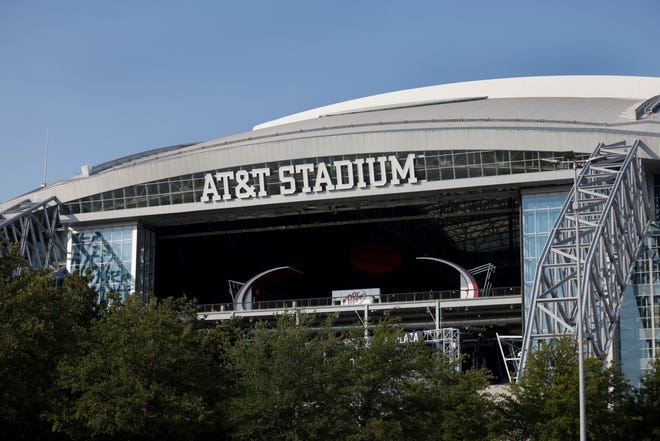 The outside of AT&T Stadium is shown with the end zone doors open before an NFL football game between the Dallas Cowboys and the Cleveland Browns in Arlington, Texas, Sunday, Oct. 4, 2020.