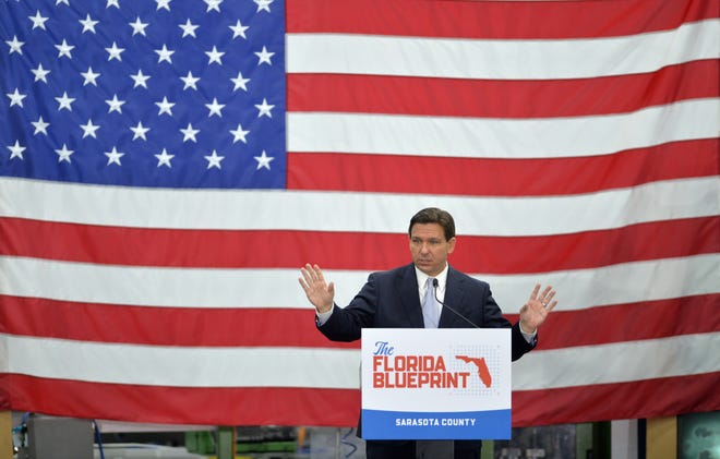 Florida Governor Ron DeSantis speaks to a crowd of supporters for a campaign-style event to kick off his new book "The Courage to be Free" on Tuesday morning at PGT Innovations in Venice.