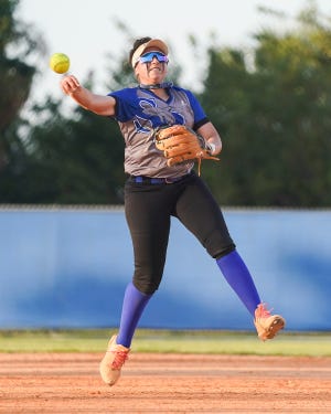 Sebastian River's Malia Binafif (9) throws to first base against John Carroll Catholic in a softball game Wednesday, March 30, 2022, at Sebastian River High School. Sebastian River won 12-8.