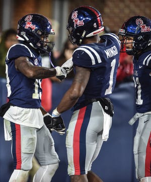 Ole Miss WR Dayton Wade (19) celebrates a touchdown with WR Jonathan Mingo (1) at the 2022 Egg Bowl at Ole Miss' Vaught-Hemingway Stadium in Oxford, Miss., Thursday, November 24, 2022. Mississippi State beat Ole Miss with a final score of 24-22.