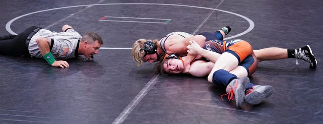Jensen Beach senior Ashton Roeder wrestles Benjamin's Sawyer Leverve at 160 pounds during the District 13-1A Championships on Friday, Feb. 17, 2023 in Jensen Beach. Roeder won the championship helping the Falcons win the team title.