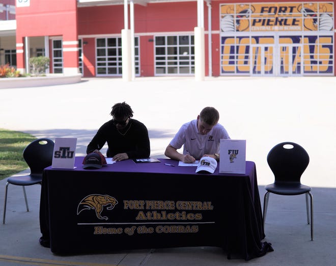 Fort Pierce Central's Andrew Thomas (St. Thomas) and Tyler Patterson (FIU) signed letters of intent to continue their football careers on National Signing Day held on Wednesday, Feb. 1, 2023.