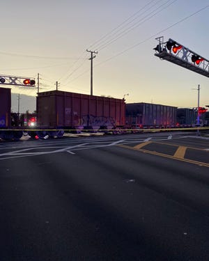 Freight train cargo is pictured stopped on the 12th Street crossing early Friday Feb. 17, 2023 after Florida East Coast Railway workers reported a pedestrian was struck and killed on tracks just to the north shortly after 6 a.m., according to Indian River County Sheriff's Office.