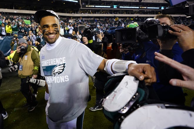 Philadelphia Eagles quarterback Jalen Hurts reacts after the NFC Championship NFL football game between the Philadelphia Eagles and the San Francisco 49ers on Sunday, Jan. 29, 2023, in Philadelphia. The Eagles won 31-7. (AP Photo/Chris Szagola)