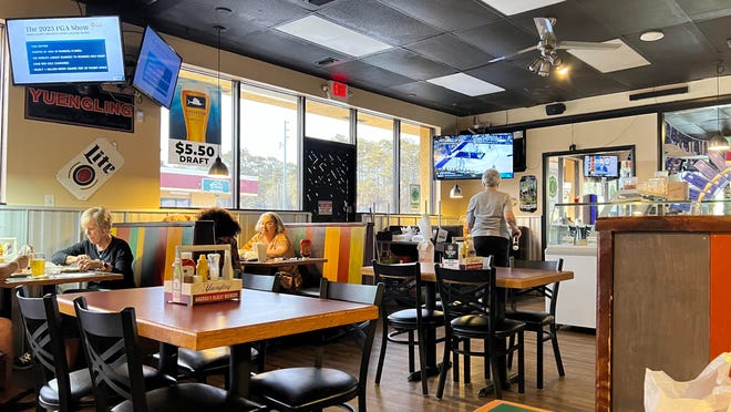 Veciono's Family Restaurant has a sports bar feel with a number of TVs and vintage-style beer and other beverage signs on the walls.