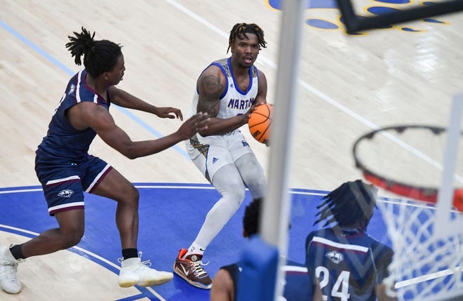 Martin County's Elijah Duval (3) goes for a basket against Dwyer in a boys high school basketball game, Wednesday, Jan. 18, 2023, at Martin County High School in Stuart. Dwyer won 53-52.