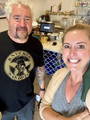 Gilbert's Coffee Bar owner Abigail Rogan (right) takes a selfie with Food Network star Guy Fieri on Monday, Feb. 22, 2021. Rogan said Fieri told her he was looking at real estate in the area.