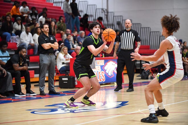 Windermere wins 73-65 against Centennial in a boys high school basketball Region 2-7A quarterfinal, Thursday, Feb. 16, 2023, in Port St. Lucie.