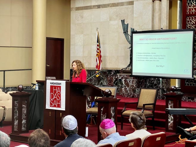 Josephine Gon, vice president of Jewish Community Relations Council, addresses a crowd at Temple Beit Hayam in Stuart on Feb. 5 about antisemitism.
