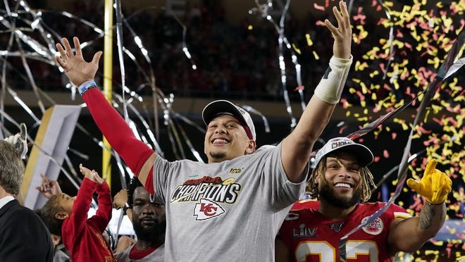 Kansas City Chiefs' Patrick Mahomes, left, and Tyrann Mathieu celebrate after defeating the San Francisco 49ers in the NFL Super Bowl 54 football game Sunday, Feb. 2, 2020, in Miami Gardens, Fla.
