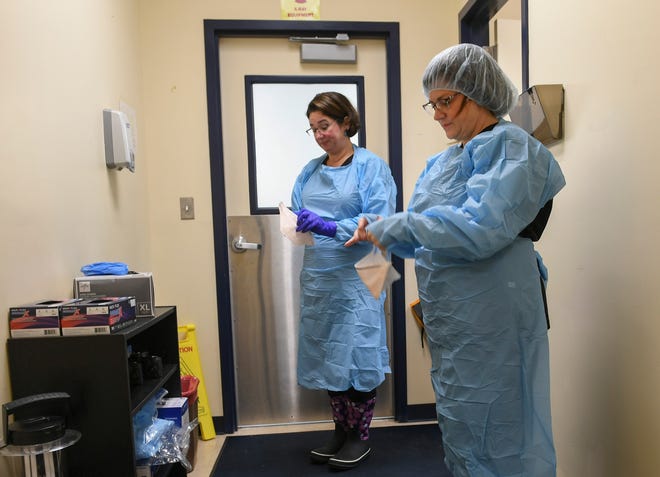 Dr. Adrienne Sauder (left) and Dr. Patricia Aronica, chief medical examiner for District 19 Medical Examiner's Office.
