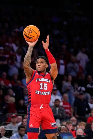 Mar 25, 2023; New York, NY, USA; Florida Atlantic Owls guard Alijah Martin (15) shoots during the first half of an NCAA tournament East Regional final against the Kansas State Wildcats at Madison Square Garden. Mandatory Credit: Robert Deutsch-USA TODAY Sports