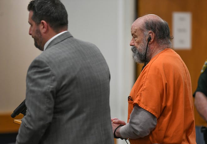 Wearing earphones, James Stephenson stands motionless with his attorney, Assistant Public Defender Matthew Vasko, while being sentenced by Judge William Roby to life in prison without parole on Monday, March 6, 2023, in the Martin County Courthouse in Stuart.  Stephenson pled guilty to the first-degree murder of Lori Summer White, of Texas, who was found dead on June 21, 2022, inside a home in the 4400 block of Honey Terrace in Palm City.