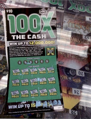 During the June 2022 criminal investigation of Christine Nicole Fenton-Gilbert, 39, of Fort Pierce, special agents with the Florida Department of Lottery recovered more than a dozen scratch-off tickets from the Rebel Store in Jensen Beach that showed “micro-scratch” marks indicating the tickets had been altered.