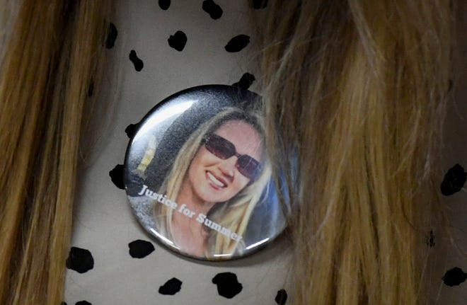 Family members wear a button for Lorri Summer Wright, 49, of Texas, while in the courtroom during the sentencing of James Stephenson, who pled guilty for the murder of Wright on Monday, March 6, 2023, at the Martin County Courthouse in Stuart. Wright was found dead June 21, 2022 inside a Palm City home in the 4400 block of Southwest Honey Terrace.