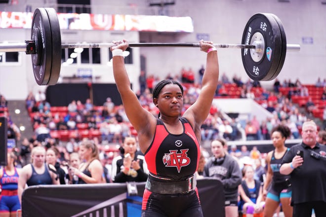 Vero Beach's Enyjai Tyson competes in the clean-and-jerk event as part of the Olympic lifts portion of the FHSAA Girls Weightlifting Championships that took place on Saturday, Feb. 18, 2023 at the RP Funding Center in Lakeland.