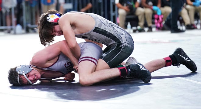 Jensen Beach's Sebastian Degennaro battles First Baptist's Jonathan Moder in the final at 120 pounds at the FHSAA Championships held at Silver Spurs Arena on Saturday, Mar. 4, 2023 in Kissimmee.