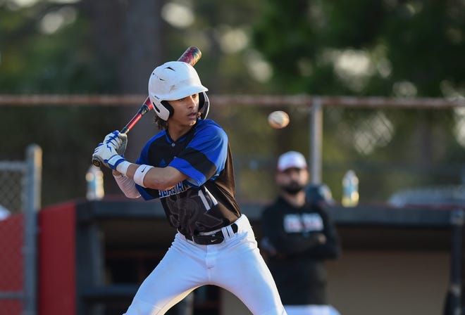 Sebastian’s Ethan Camilo (11) swings the bat against Vero Beach during a high school baseball game, Friday, March 17, 2023. Vero Beach won 10-3.
