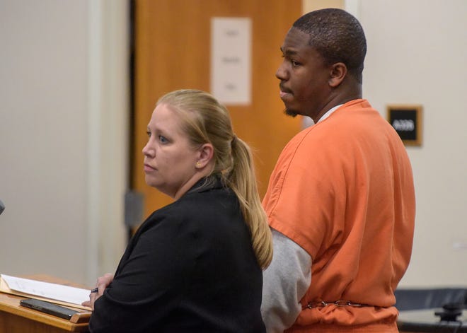 Alton Lee Edwards (right) a former Martin County High School boys basketball assistant coach, stands with his attorney Whitney Duteau during a plea hearing before Judge William Roby on Tuesday, March 7, 2023 at the Martin County Courthouse in Stuart. Edwards pleaded no contest to six counts of lewd computer solicitation of a minor by an authority figure and was sentenced to seven years concurrent on three counts.