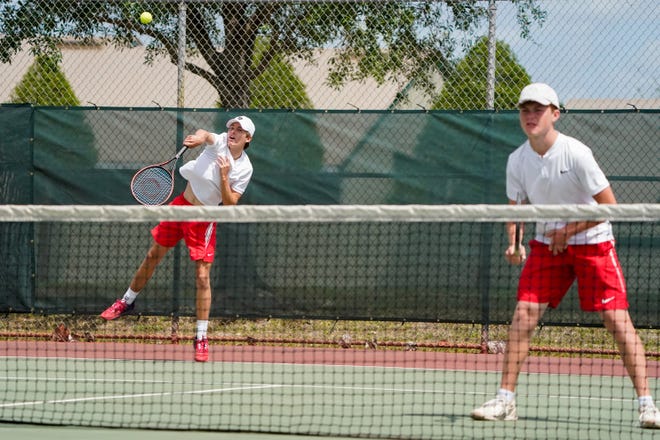 Vero Beach’s Figge Pernfors (left) and Mason Cisco during the District 10-4A boys and girls tennis championships on Tuesday, April 12, 2022 at Whispering Pines Park in Port St. Lucie.