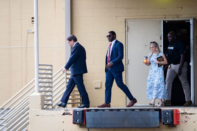 Gov. Ron DeSantis exits the backdoor of Books A Million after signing books for supporters Thursday, March 23, 2023.
