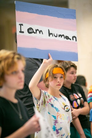 An estimated 200 people chanted while standing in the fourth floor rotunda of the Florida Capitol while the House of Representatives passed HB 1069, which is an expansion of the “Don’t Say Gay” bill from last session, Friday, March 31, 2023.