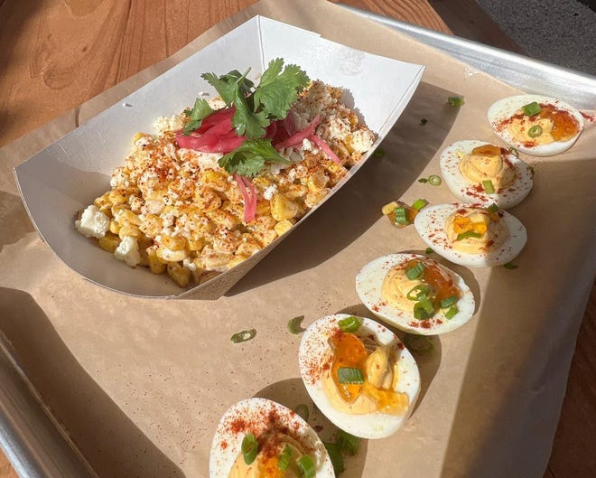 Blue Water Barbecue opened Feb. 15 in Hobe Sound. Its menu includes snacks, such as street corn with pickled red onion, cilantro, queso fresco and Tajin seasoning.