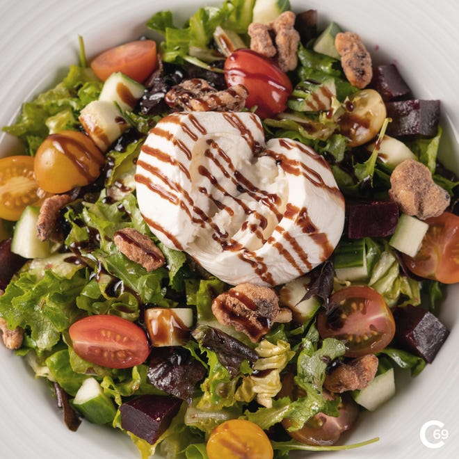 Circa69 American Gastropub opened Feb. 28, 2023, on Indian River Drive in Jensen Beach. Its menu includes the Circa69 salad with organic greens, goat cheese, figs, candied pecans and maple vinaigrette.