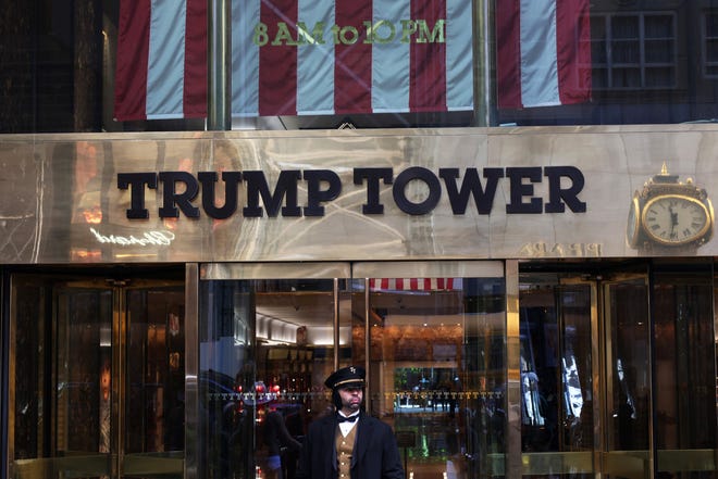 A doorman stands outside of Trump Tower on March 21, 2023 in New York City. NYC and other cities are bracing for a possible indictment of former President Donald Trump by Manhattan District Attorney Alvin Bragg in his investigation into the former president's involvement in a hush money payment to adult film actress Stormy Daniels prior to the 2016 presidential election.
