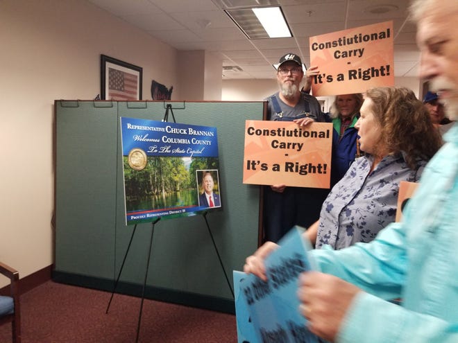 During the 2022 session, Suwannee County residents crowd into Rep. Chuck Brannan's office to ask him to schedule an open carry measure in the Criminal Justice committee he chaired.