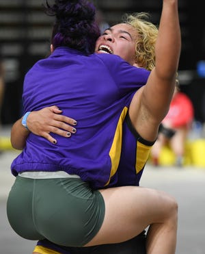 Gaby Perez of Fort Pierce Central celebrates her state title win over Lucy Maris of Satellite at the FHSAA state wrestling meet in Kissimmee.  Craig Bailey/FLORIDA TODAY via USA TODAY NETWORK