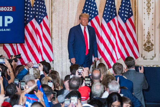 Former President Donald Trump looks at supporters as he arrives to a press event at Mar-A-Lago on Tuesday, April 4, 2023, in Palm Beach FL. Former President Trump returned to Mar-A-Lago Tuesday evening after facing arraignment in New York earlier in the day.