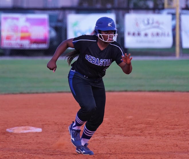 Sebastian River's Amonty Johnson runs to third base during a high school softball game against Martin County on Thursday, Mar. 9, 2023 in Sebastian. The Sharks won 11-3.