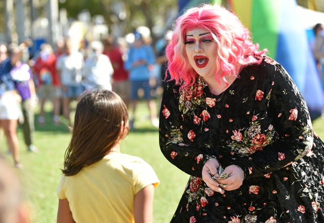 Drag queen Mistah Aphrodite, performs at Manatee Pride. More than 400 people gathered to celebrate Manatee Pride at Bradenton's Riverwalk Pavilion, an LGBTQ+ annual family event benefiting ALSO Youth, a Florida non-profit supporting LGBTQ+ youth in the state. Over 55 vendors along with local sponsors participated in the event that featured drag queen performances, live music, food, beer, along with health checks.