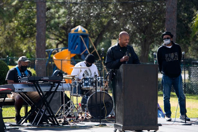 Indian River County Deputy Chief Milo Thornton spoke to the crowd during a Martin Luther King Jr. Day celebration Monday, Jan. 18, 2021, at St. Peter's Missionary Baptist Church in Gifford. Attendees stayed near their vehicles along 38th Avenue and spread out in chairs in the church parking lot to be cautious during the coronavirus pandemic. The annual holiday parade was canceled this year, so event coordinator Linda Morgan decided to plan an observance at the church. "With everything going on in the world today, we've gotta keep hope alive among the people," she said.