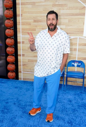 Adam Sandler, a cast member in the Netflix film "Hustle," poses at the premiere of the film, Wednesday, June 1, 2022, at the Regency Village Theatre in Los Angeles. (AP Photo/Chris Pizzello) ORG XMIT: CACP114