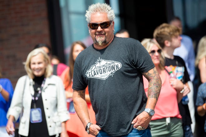 Guy Fieri during a grand opening event for Fieri's Downtown Flavortown in Pigeon Forge, Tennessee, on June 13, 2022. Later the same month, Fieri visited multiple restaurants in Volusia County for upcoming episodes of his hit Food Network show "Diners, Drive-Ins and Dives."