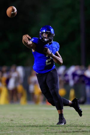 Trinity Christian Academy's Colin Hurley (2) throws the ball for a touchdown pass during the first quarter of a regular season football game Friday, Sept. 23, 2022 at Trinity Christian Academy in Jacksonville.