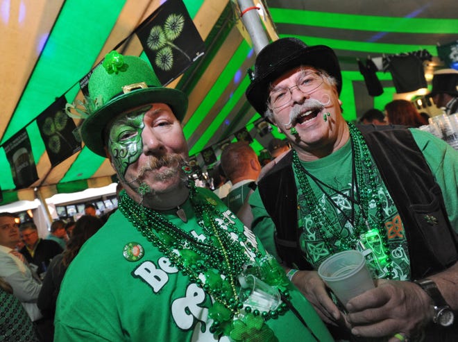 Mark Frank, left, and friend Rich Neil celebrate St. Patrick's Day at Culhane's Irish Pub in Atlantic Beach in 2014.