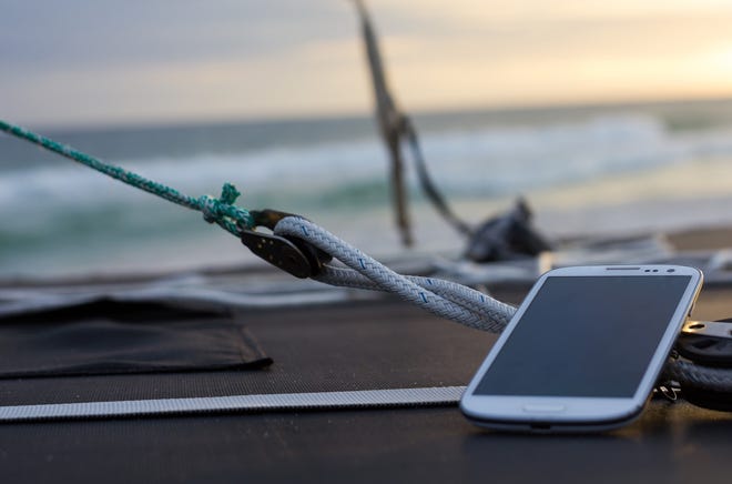 A smartphone is shown on a boat. Texting while boating can distract a vessel's operator. On Florida's Treasure Coast, operator inattention accounted for more than a third of boating accidents between 2014 and 2018.