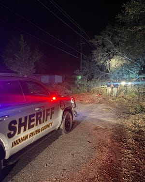 A team of Indian River County deputies in Charlotte County on Oct. 3, 2022, helped clear trees and debris from roads for power restoration work after Hurricane Ian hit days before.