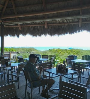 The view and shade of the tiki hut are just magnificent.