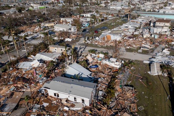 Damage to a Fort Myers neighborhood near a bridge to Fort Myers Beach after Hurricane Ian on Sept. 29 2022.