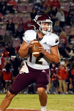 Niceville quarterback Harrison Orr looks downfield to pass during a game held on Friday, Sept. 30, 2022 in Crestview.