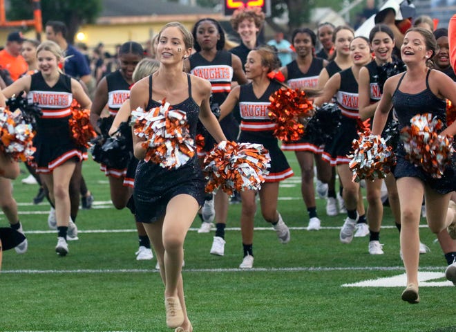 Lakeland dancers and cheerleaders follow the team on to the field prior to the Dreadnaughts' game against Seffner Armwood last week in the kickoff classic.