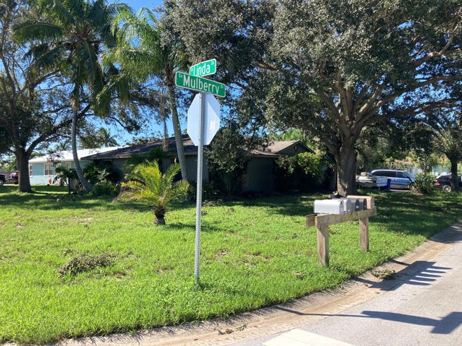 A Hobe Heights property at the corner of Southeast Linda Drive and Southeast Mulberry Drive on Sept. 30, 2022, is spared from flooding after minimal impacts from Hurricane Ian hit Martin County. The home was flooded two years prior after torrential rains overwhelmed the neighborhood starting Memorial Day.