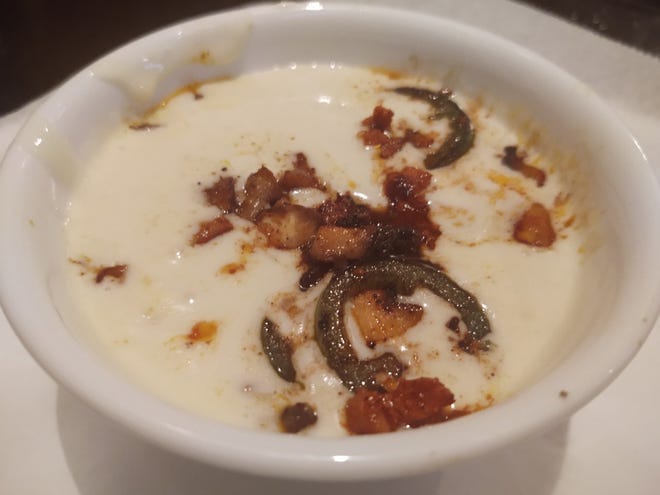 El Rey Chori-Queso dip consists of Mexican chorizo, mushrooms and jalapeno peppers in a cheesy Queso.