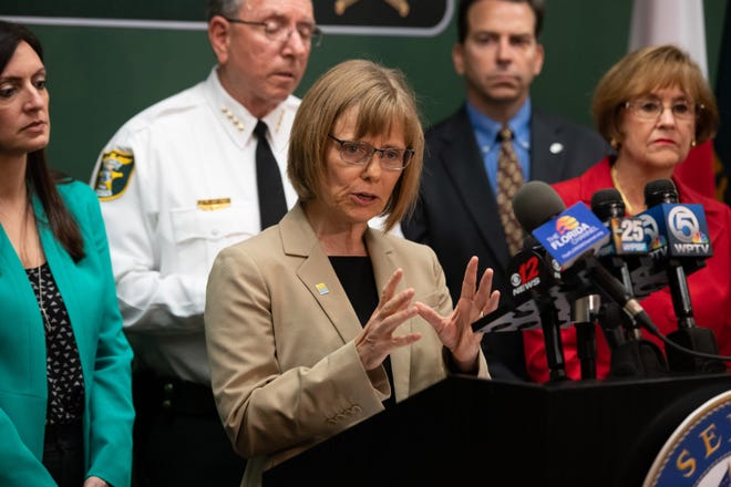 Carina Blackmore, the state's Division of Disease Control and Health Protection director, speaks at a news conference April 12, 2019, in Martin County.