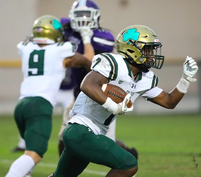 Ocala Trinity Catholic running back Jamarcus Starkes (7) runs up the field after making a catch during a game against Gainesville High School, at Citizens Field in Gainesville FL. Sept. 8, 2022.   [Brad McClenny/The Gainesville Sun]